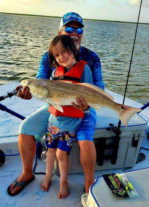 My 6-year-old grandson Jackson Worley caught his first fish, a 11.7 lb, 30” red on cut bait. He was fishing with his mom, Tylar Murphy. Happiest day ever with him!  -Michael Murphy