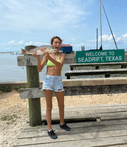 Danika fishing with her PopPop. 23” Redfish -Lorraine Eastep