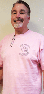 Ken Marr Jr. grandson of the late Roy and Ruth Young of Port O”Connor, proudly wears his pink POC volunteer fire shirt, supporting the cause, while at work in Aberdeen, NJ. on wear pink to work day. Awesome shirt for a awesome cause. 