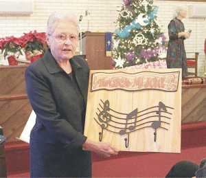 Nancy Childress, Seadrift Community Choir Director, was presented a gift from the choir. 