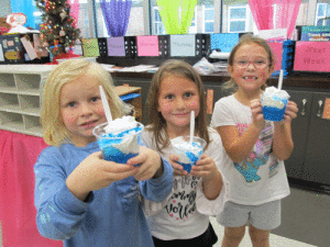 POC Kindergarten enjoyed a cloud snack when learning about clouds.  Pictured left to right Kai Chance, Elizabeth Tolar, and Kynslee Brown. -Monica Peters