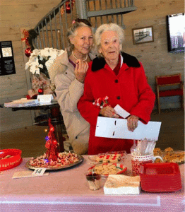 Grace celebrates her 106th birthday on February 8.  	She is pictured above tasting Christmas cookies with her daughter Susie Onishi.
