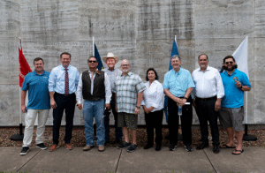 U.S. Representative Michael Cloud (second from left) and Judge Richard Meyer (fourth from left) with local ministers from Calhoun County met, along with a number of others, at the Port Lavaca Courthouse to observe the National Day of Prayer. -Photo by Angela Castillo