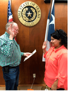 Mayor Elmer DeForest sworn in by City Secretary, Gabriella Torres