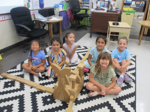 As the summer break begins, Ms. Peters’ Science, Technology, Engineering, and Math class builds a castle out of blocks for Cinderella.