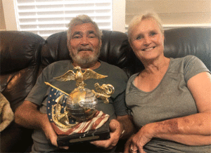 Jimmy & Linda Odom with Marine trophy from their son