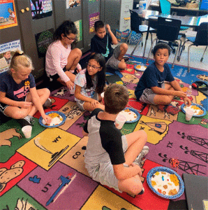 In 3rd and 4th grade science, we learned the difference between a solution and mixture. We mixed Chex Mix, M&Ms, and Smarties together. In the mixture, We were able to pick out the candy and put them in different containers; however, when we made our Kool-aide solution, we could not take the sugar out and put it in a separate container! We learned that items in a mixture will generally just mix and are not completely dissolved or changed. In a solution, substances completely dissolve and cannot be filtered out. Science can sometimes taste great! -Sheryl Haynes, Port O’Connor School