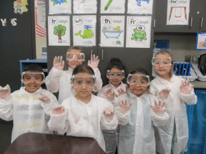 When learning about what a scientist uses and wears, Ms. Peters’ Kindergarten POC class got to dress like a scientist. Pictured left to right front row-Kayden Cardenas, Alessia Smith, Penelope Gonzales. Back row-Vivian Kipp, Ashlynn Austin, and Brooklyn Vossler.