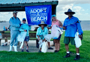 Group of hardworking beach cleanup volunteers: Chris Kram, Honey Doan, Terri Schmidt, Pam & Blain McNally - includes friends from New Braunfels and Sugarland who come to stay with Katy/PO’C homeowners. They collected an estimated 75 pounds of trash including some metal pipes and wire. 