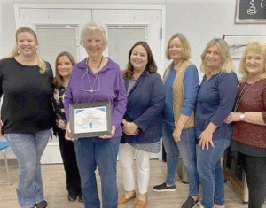 Left to right: Assistant Librarian Margaret Claiborne, Calhoun County Library Director Dina Sanchez, Honoree Mary Ann Claiborne, Librarian Michelle Marlin, Ursula Price, Sherri Judice, and Alane Haardt