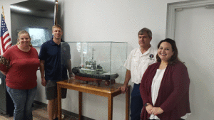 (L-R: Assistant Librarian Margaret Claiborne, Pilot Frank Byrne, Pilot Mike Clifton and Librarian Michelle Marlin). 