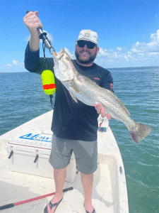 Austin ‘Dink’ Coan caught this 27” trout while soaking croaker at the Port O’Connor jetties with his cousin and mentor, Clay.