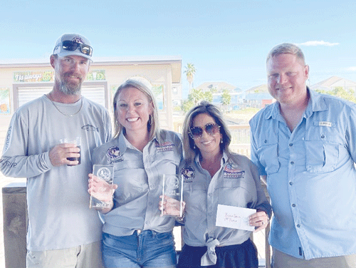 Purple Heart Warrior Erica Green (third from left) and her Veteran husband James Green with guide Addison Cooley and sponsor Gidgett Bigham. Erica won 1st place Black Drum and was Top Angler in the Purple Heart Classic.
