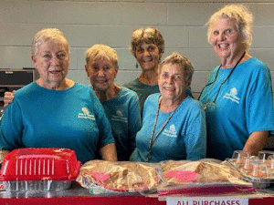 Working at the Garage & Bake Sale, some of the Service Club’s longest-serving members: Left to Right: Nancy Childers, Kay Middleton, Marie Hawes, Pat Ekstrom and Mary Ann Claiborne -Photo by Barbara Rhyne