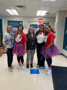 Seadrift School Admins welcoming Cat in the Hat, Thing 1, and Thing 2 to Seadrift to begin Read Across America Week.