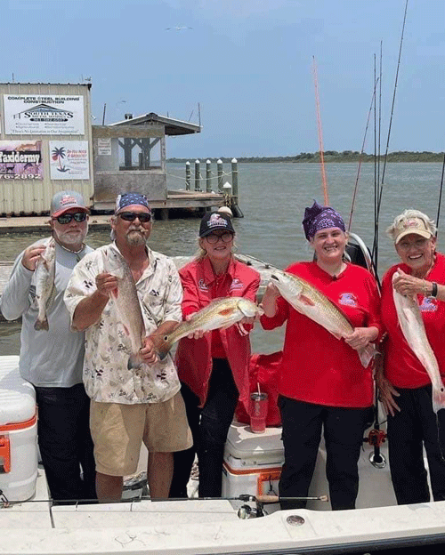 Purple Heart Hero Jason March ,second from left,  Boat Captain Henry Goode,  Maggie, Kat Armstrong , Billie Itz. at the recent Purple Heart Classic Fishing Tournament in Port O’Connor. 