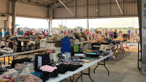 Eager shoppers ready for the garage sale to open. -Photo by Jessica Keller