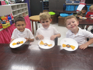 Going Batty on the 50th Day of School Dressed up for the 50th day of School looking like they were in the fifties.  Braysen Cardenas, Dean Bell, and Cannon Adney enjoy a bat snack after learning the body parts of a bat.-Monica Peters. POC 