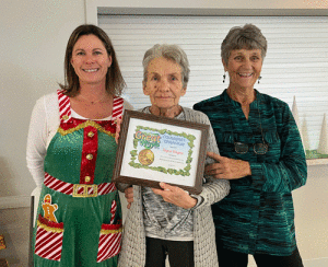 Maeghen Strahm, Nominating Committee Chair and Marie Hawes, President presented Joyce Rhyne (Dolphin Talk) with the Service Club’s Community Champion Award.