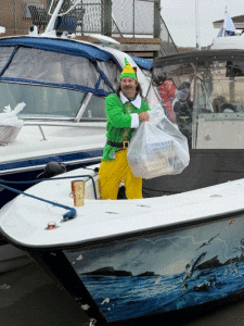 This generous “elf” was one of the boaters who made it through bad weather to deliver toys to our kids in the 19th annual Freeport to Port O’Connor Toy Run.